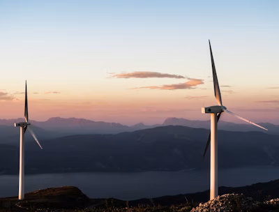 two white wind turbines
