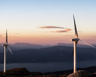 two white wind turbines