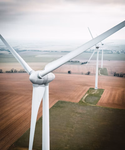 three white windmill during daytime